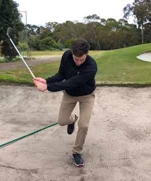 Keeping weight forward on bunker shots