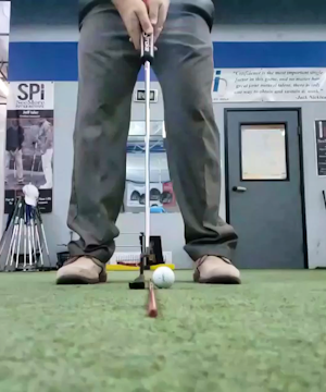 Putting - ball position and upward swing