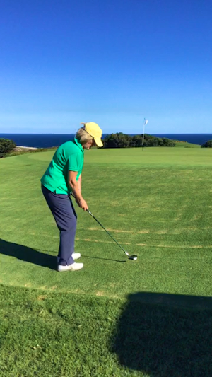 Playing a pitch shot back into the breeze at NSW Golf Club 11 Th Hole