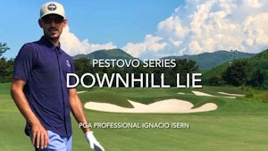 Downhill lie