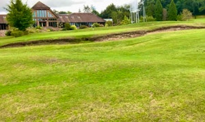 Chipping over a bunker and a long green