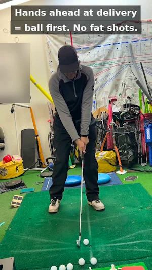 Delivery position: hands ahead = ball first, no fat shots
