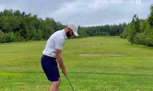 Pitch shot from tight lie off a wet ground